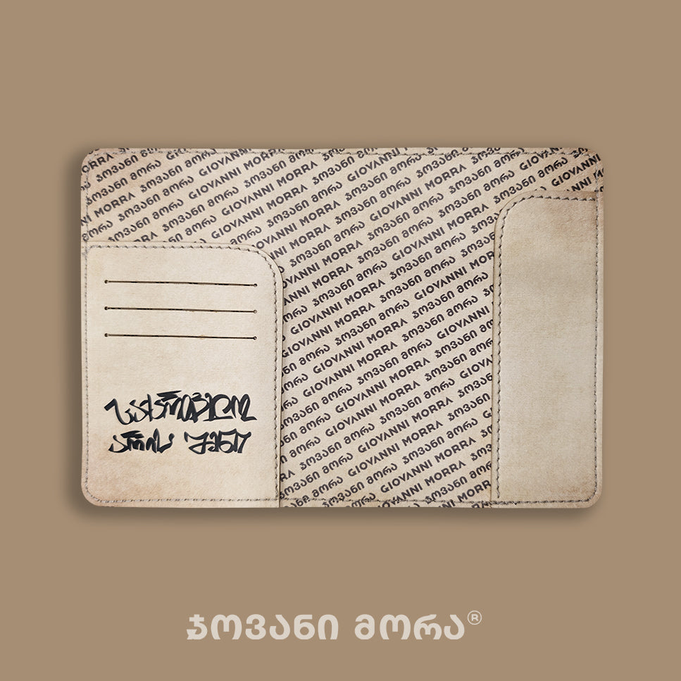 Interior of beige Independence Act passport holder with Giovanni Morra lining