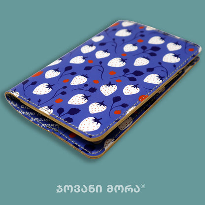 Folded blue and white Strawberries passport holder by Giovanni Morra
