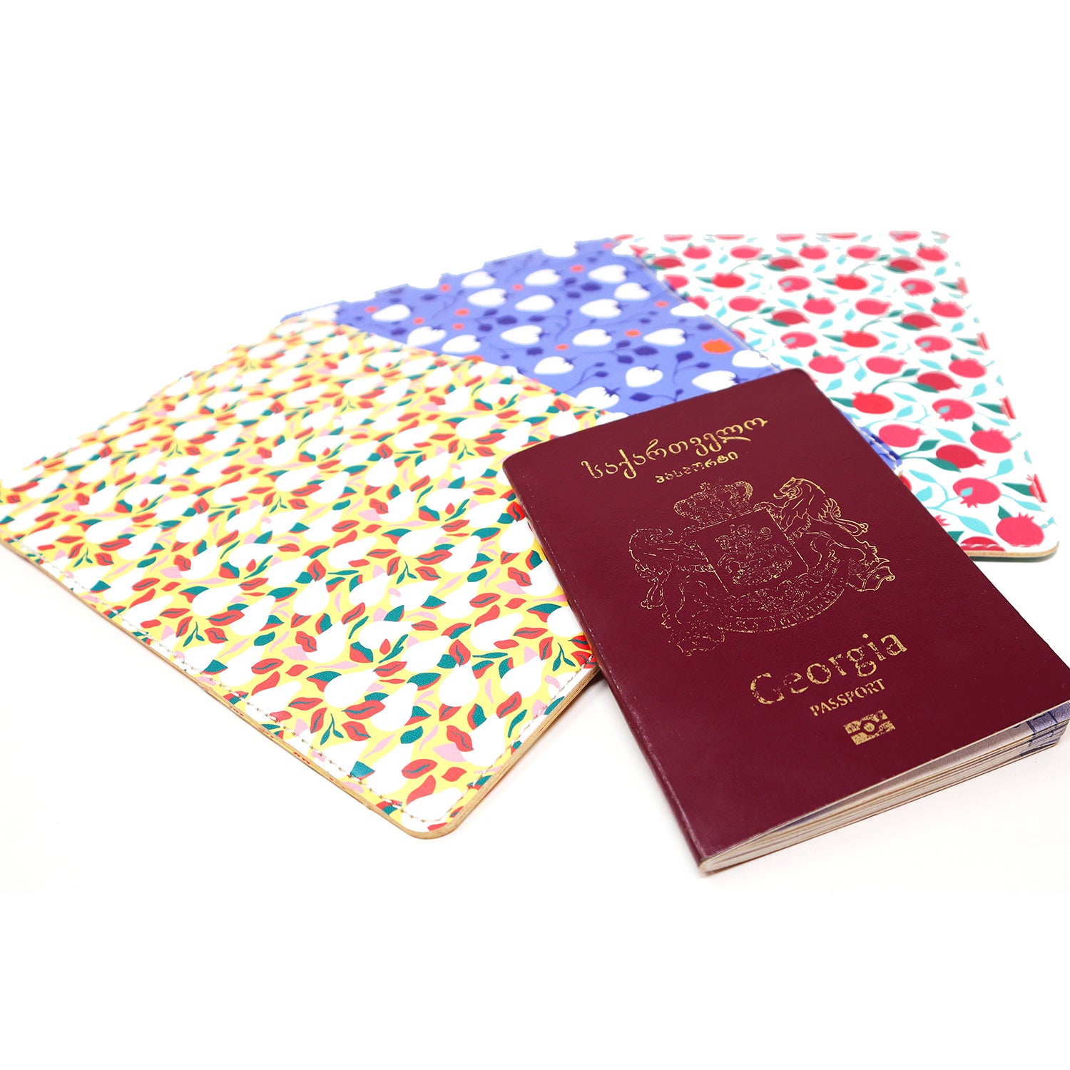 Set of Giovanni Morra fruit print passport holders with Georgian passport
